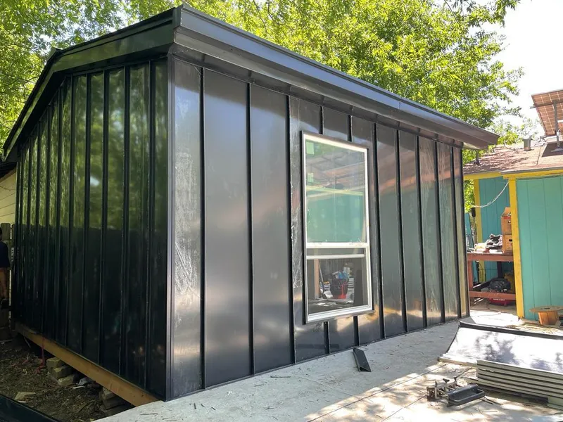 Black standing seam metal wall panels for Metal Roof Installation in Belchertown