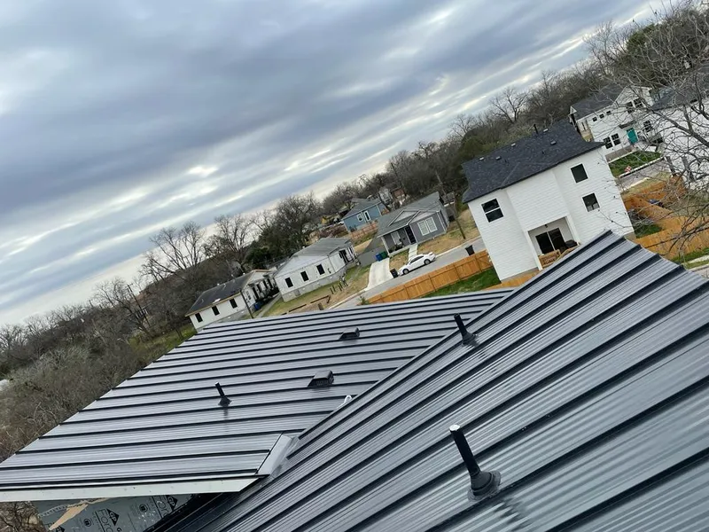 Standing seam metal roof panels with vents for Skylight Repair in Belchertown